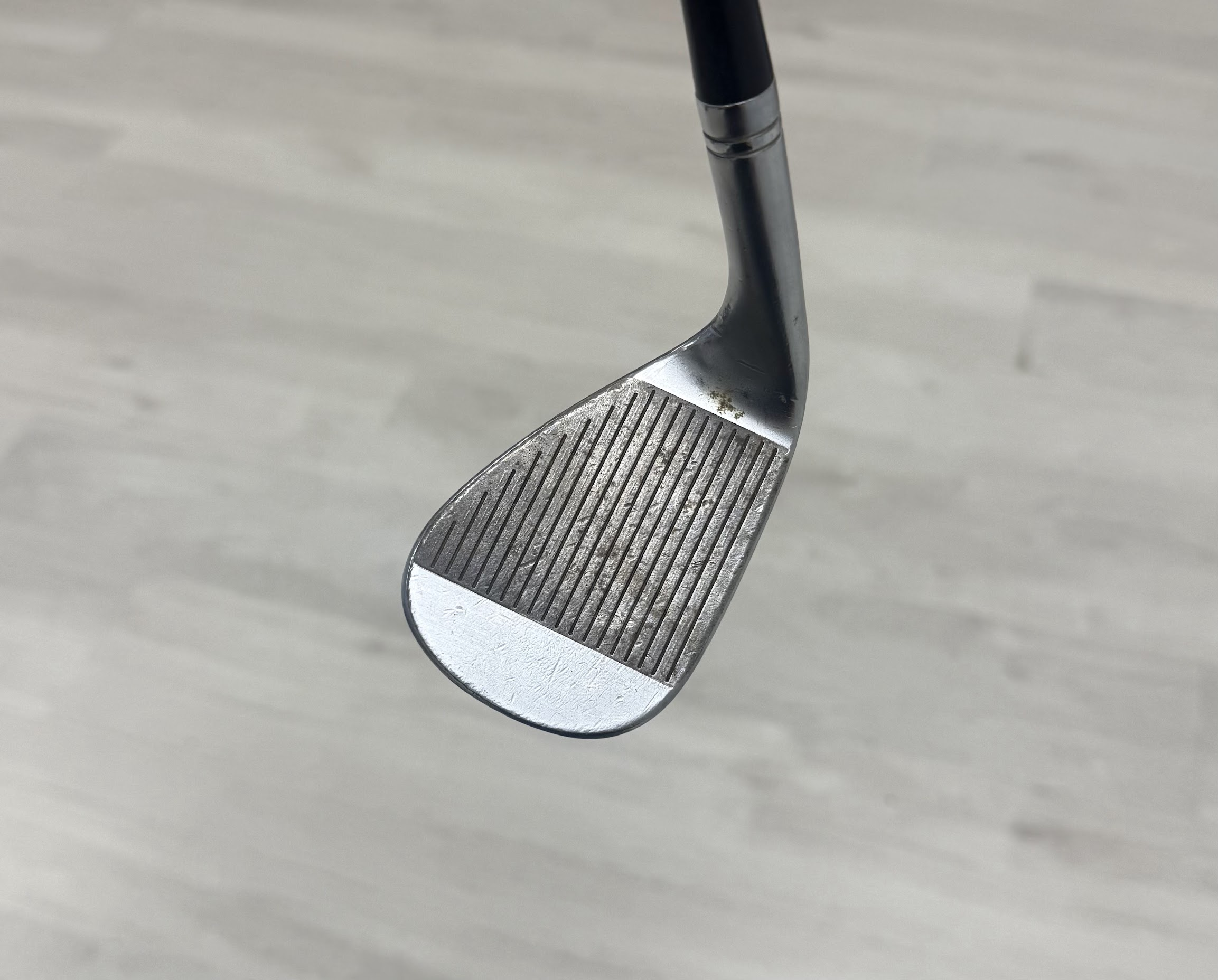 Worn golf club face before refurbishment